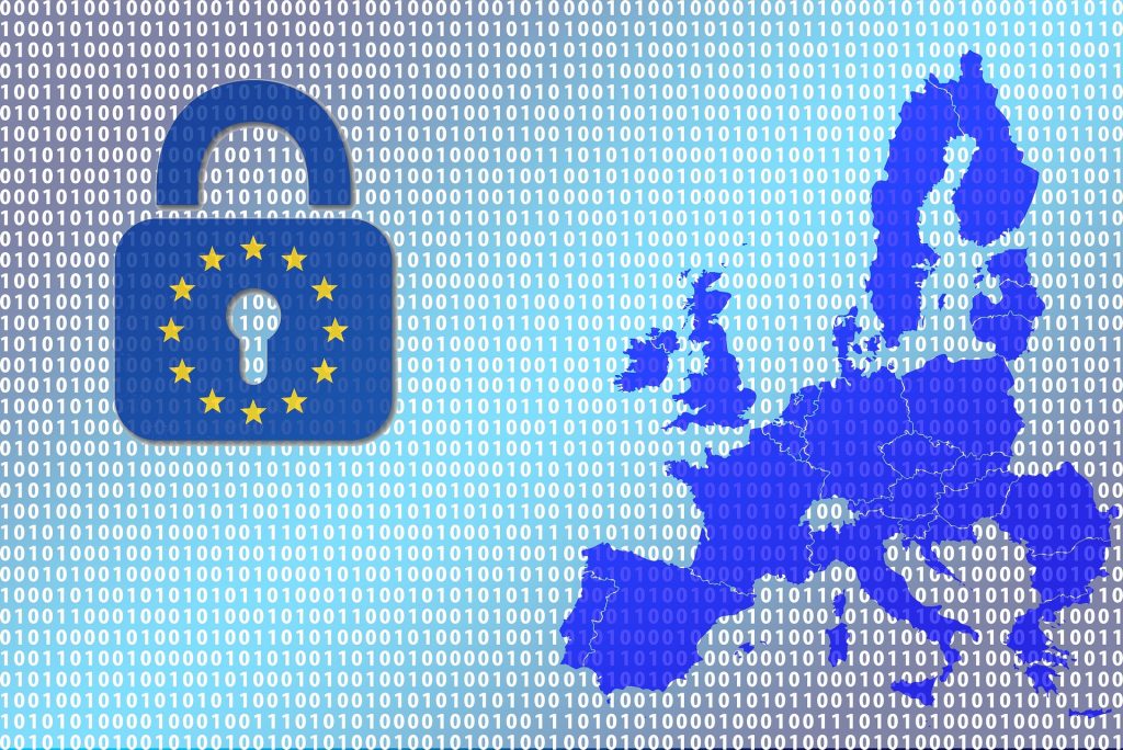 image de la carte de l'Europe sur fond de numéro 101000 comme un mur de données, avec un cadenas bleu et les étoiles de l'Union Européenne dessus afin de symboliser la loi GRPD en vigueur en Europe